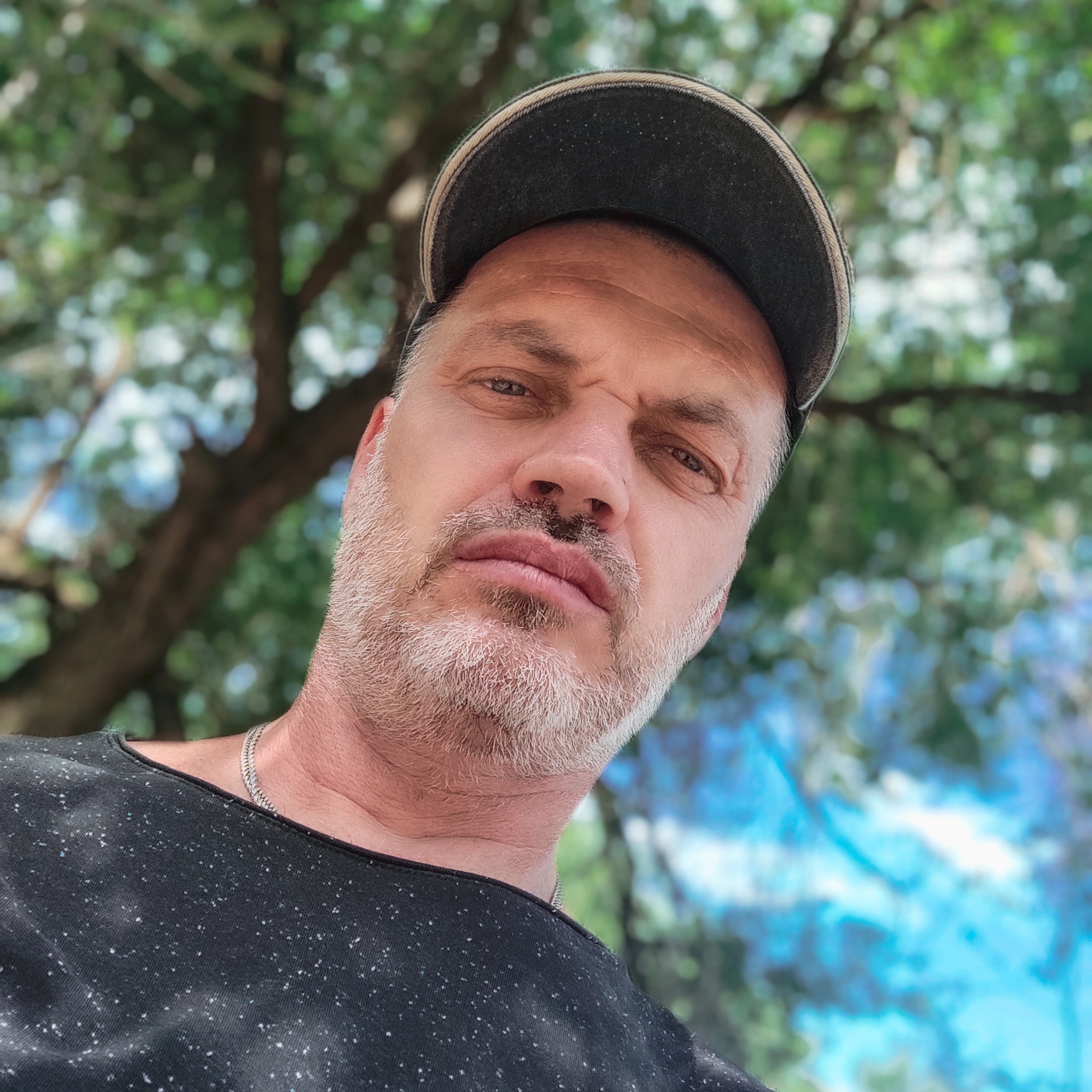 Happy junk removal client sharing testimonial about Dump Pro LA services in Los Angeles