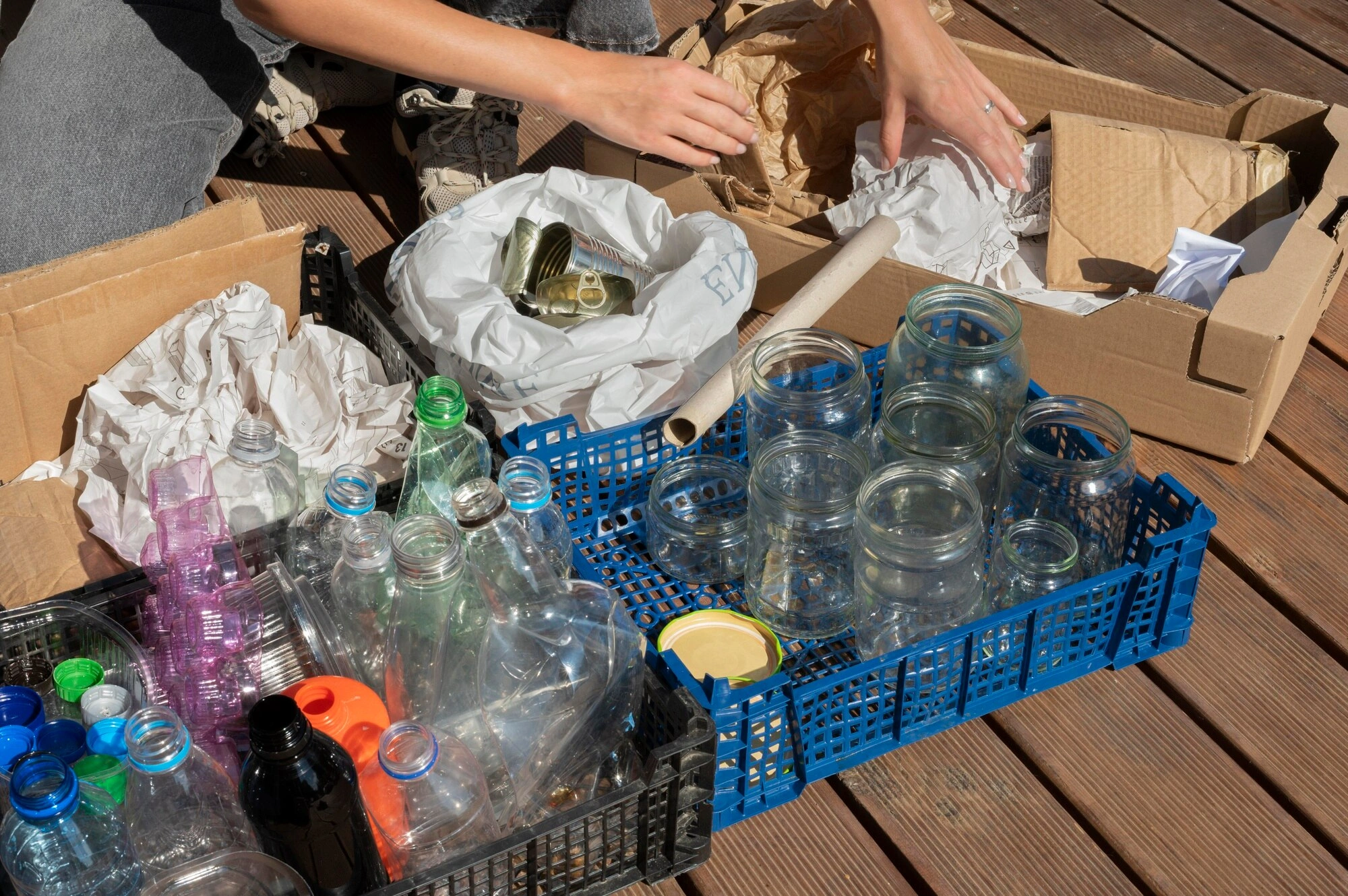 Sorted glass bottles and recyclable materials collected by Dump Pro LA in Los Angeles